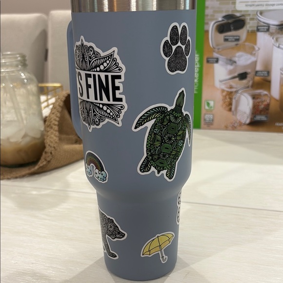 Stanley Blue Travel Mug with Vibrant Stickers - Picture 2 of 5